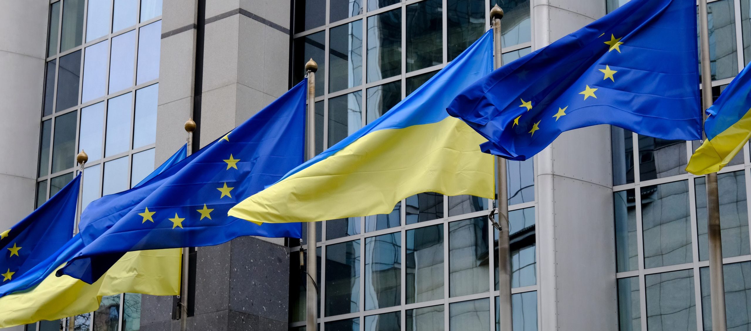 flags,of,ukraine,and,eu,fly,in,front,of,the