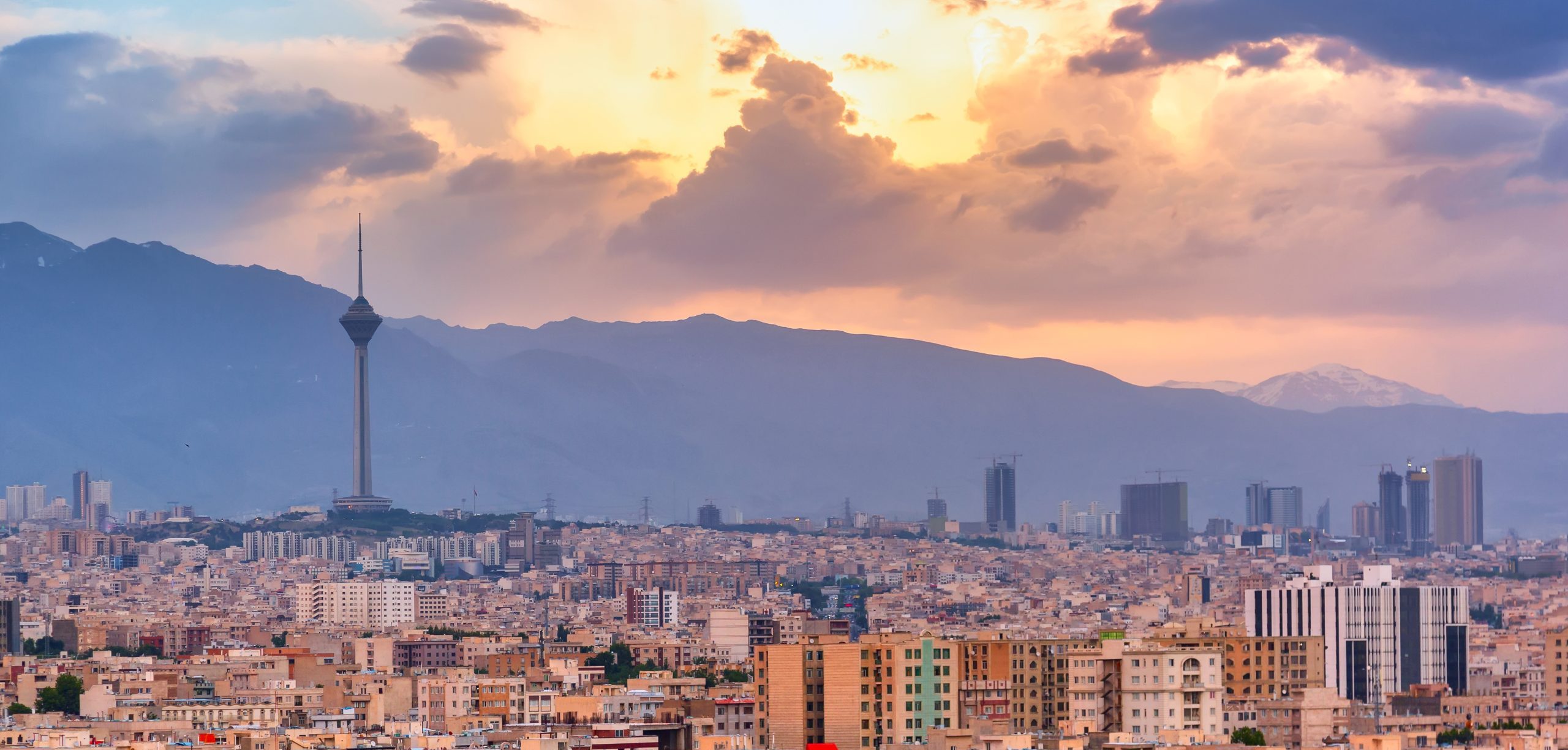 beautiful,cityscape,sunset,panorama,of,tehran,city,,mountains,and,milad